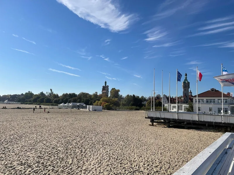 The wide Sopot beach beside the entrance to the pier.