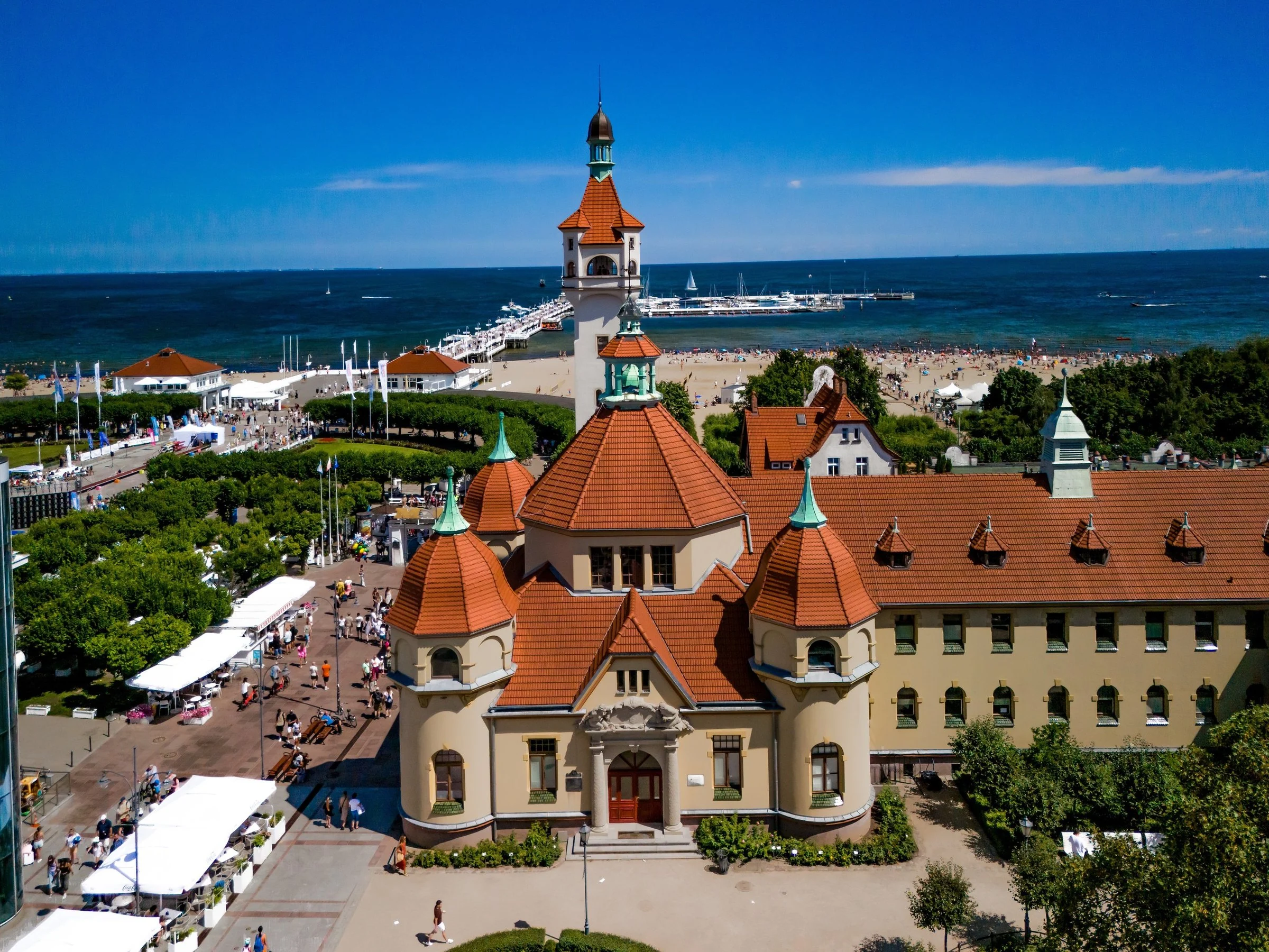 Historic buildings beside SeaSide, Sopot pier and the sea seen from above.