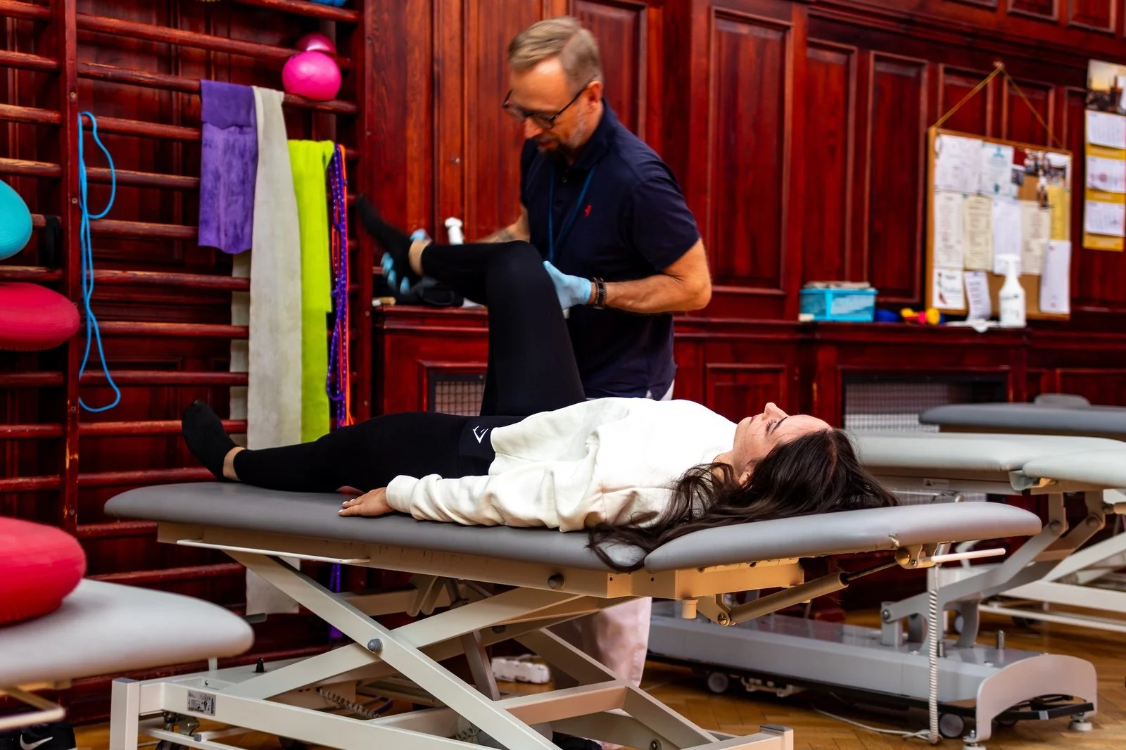 A physiotherapist working with a patient at the rehabilitation centre.